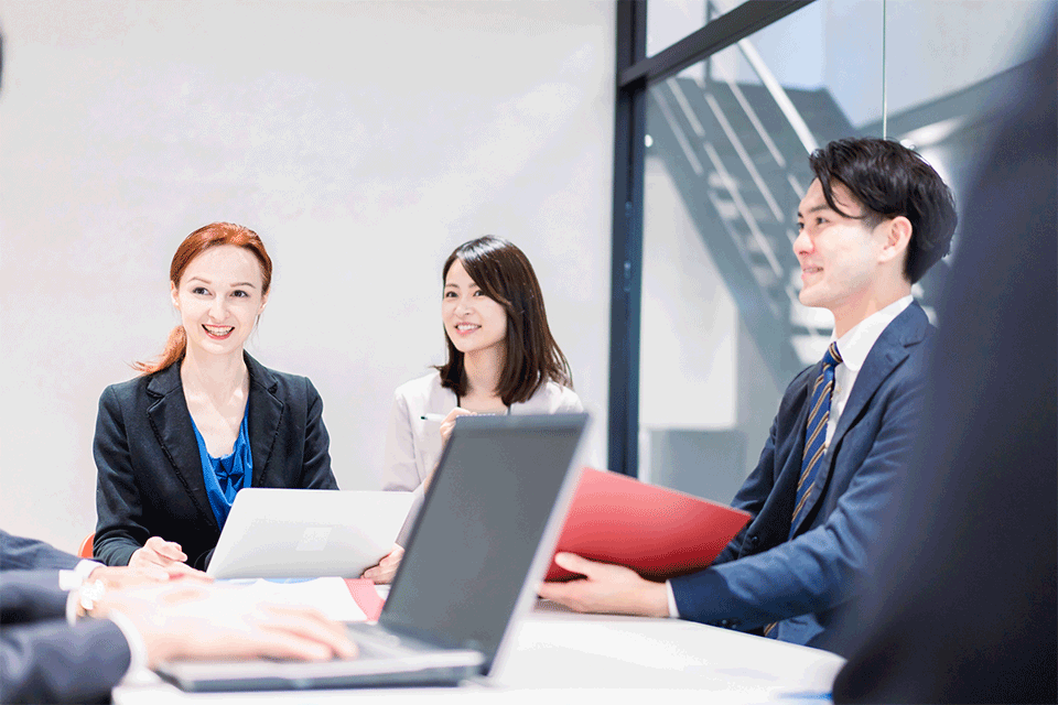 Corporate decision-makers discussing incentive trip planning in Japan