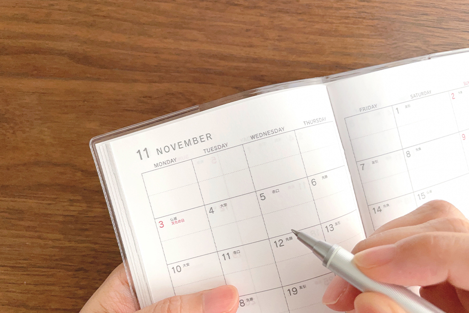 Planner reviewing the schedule for an upcoming business event